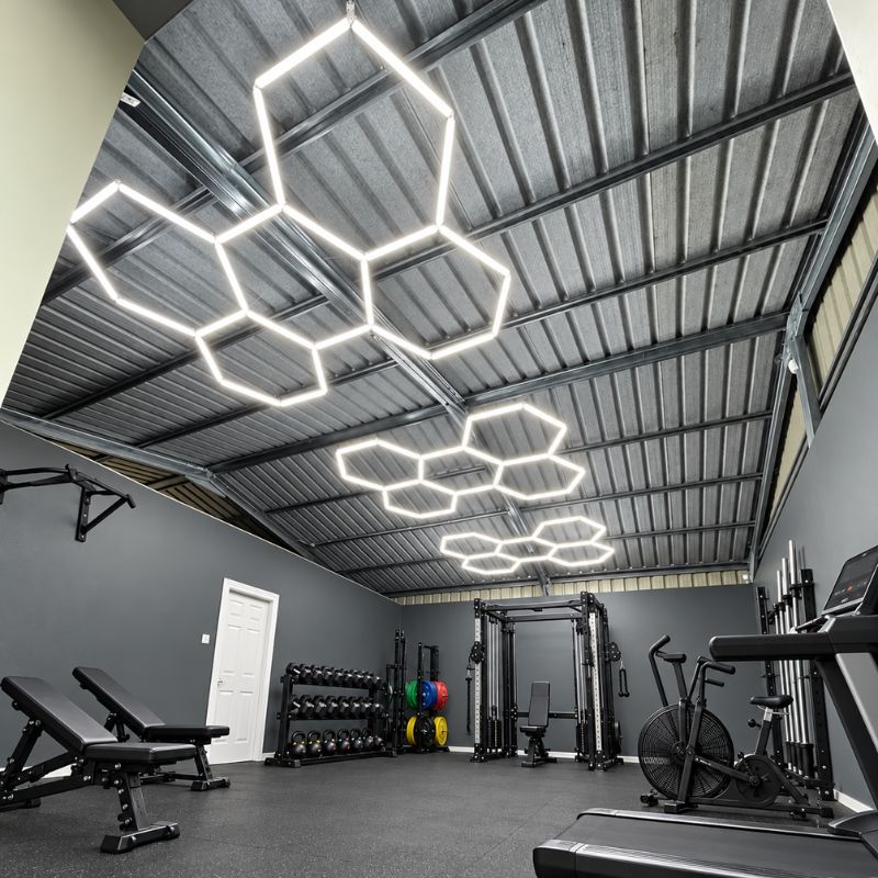 Éclairer une salle de sport : la lumière qui donne envie de s'entraîner et de filmer